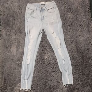 Women's Light Blue Ripped Skinny Jeans